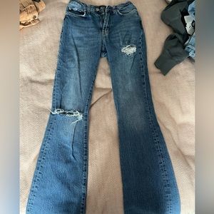 Blue flared BDG jeans with rips